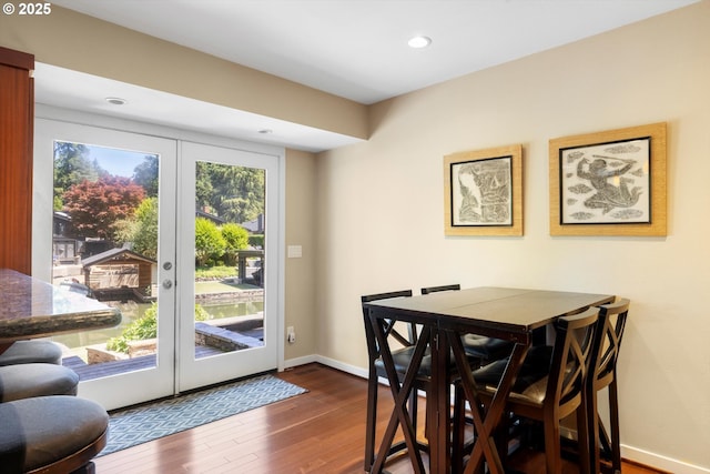17810 Sarah Hill Ln, Lake Oswego, OR 97035 - dining area featuring dark wood finished floors, french doors, and recessed lighting