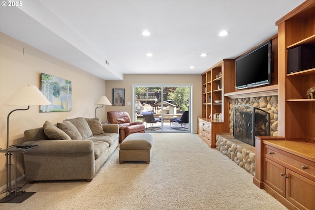 17810 Sarah Hill Ln, Lake Oswego, OR 97035 - living area featuring light colored carpet, a stone fireplace, and recessed lighting