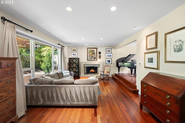 17810 Sarah Hill Ln, Lake Oswego, OR 97035 - living room featuring a warm lit fireplace, wood finished floors, and recessed lighting