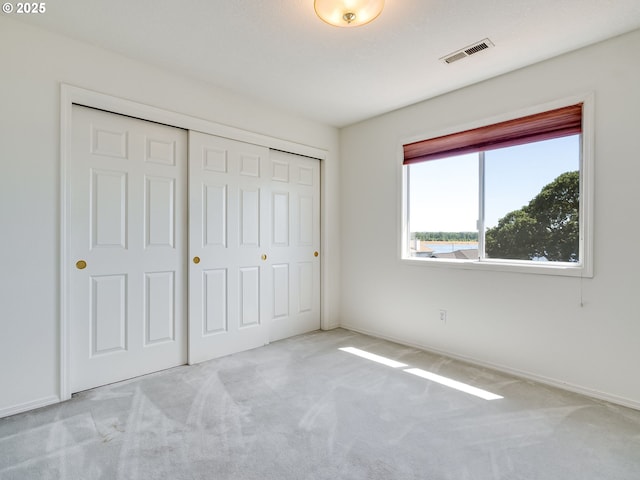 13811 SE 36th St, Vancouver, WA 98683 - unfurnished bedroom with carpet flooring, a closet, and baseboards