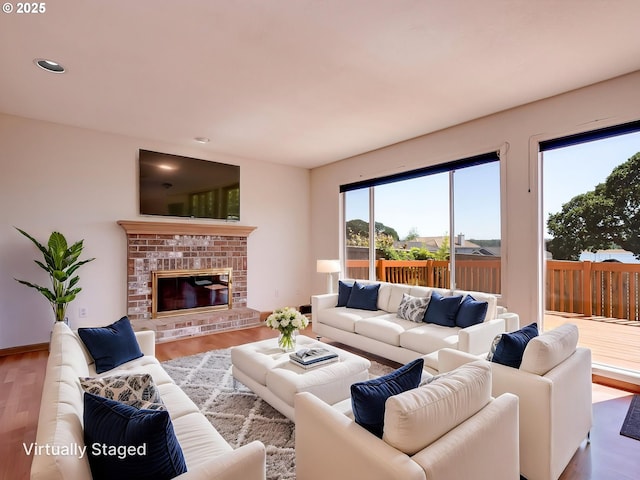 13811 SE 36th St, Vancouver, WA 98683 - living room featuring wood finished floors, recessed lighting, and a brick fireplace