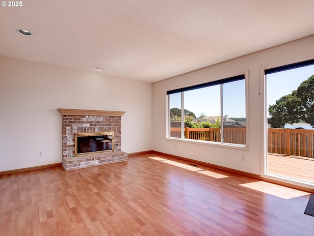 13811 SE 36th St, Vancouver, WA 98683 - unfurnished living room featuring light wood-type flooring, baseboards, and recessed lighting