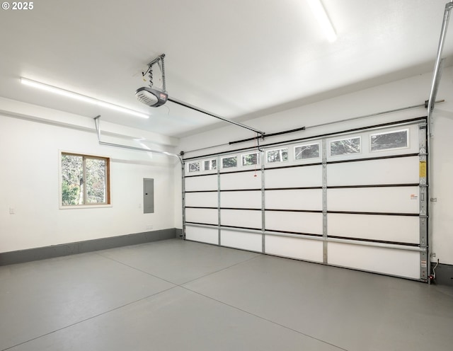 garage with baseboards, electric panel, and a garage door opener