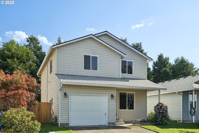 view of front of house with an attached garage, a shingled roof, fence, and driveway