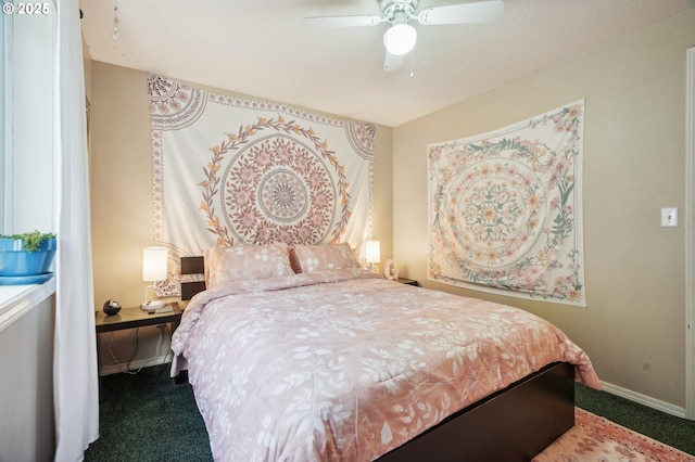 bedroom featuring carpet floors, baseboards, and ceiling fan