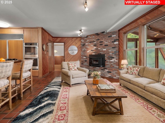 18036 NW Emmaus Ln, Portland, OR 97231 - living room featuring wooden walls and a wood stove