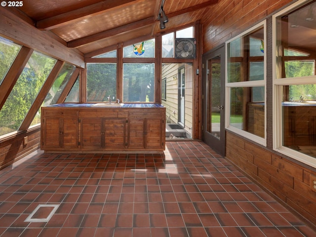 18036 NW Emmaus Ln, Portland, OR 97231 - unfurnished sunroom featuring a jacuzzi, wood walls, plenty of natural light, wooden ceiling, and a sink