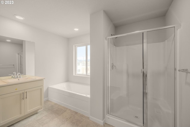 full bath featuring recessed lighting, a garden tub, a stall shower, and vanity