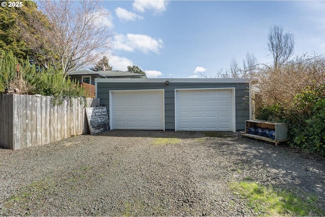 detached garage with fence