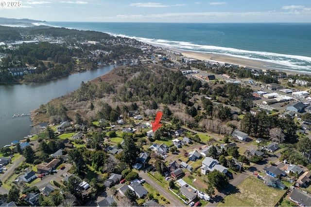 drone / aerial view featuring a water view