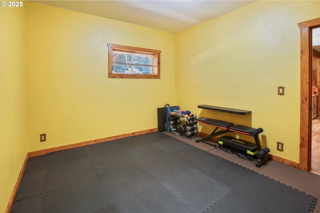 empty room featuring baseboards