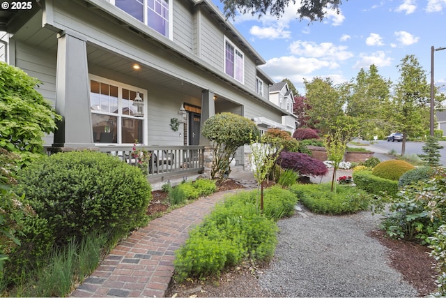 doorway to property with covered porch