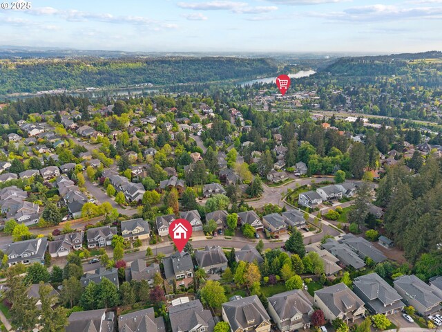 bird's eye view with a residential view and a forest view