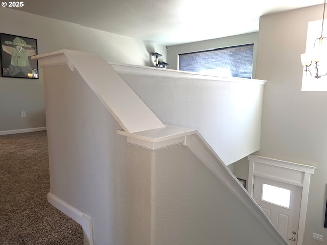 755 Nebraska St, Eugene, OR 97402 - stairway featuring carpet, a chandelier, and plenty of natural light