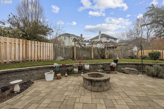 view of patio / terrace featuring a fire pit