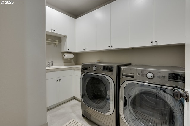 865 SW Trillium Ln, Portland, OR 97219 - laundry area featuring separate washer and dryer and cabinet space
