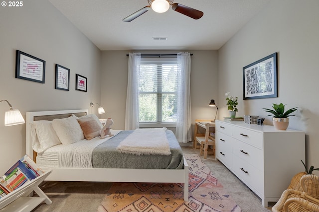 865 SW Trillium Ln, Portland, OR 97219 - bedroom with light carpet and ceiling fan