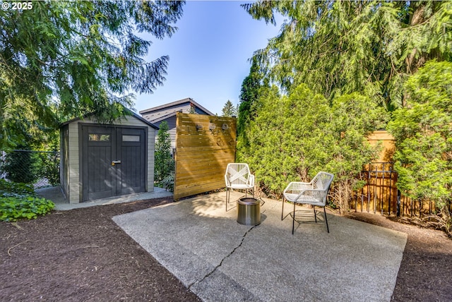 865 SW Trillium Ln, Portland, OR 97219 - view of patio / terrace featuring a storage unit