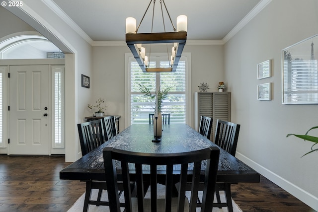 865 SW Trillium Ln, Portland, OR 97219 - dining space with crown molding, a chandelier, and dark wood finished floors