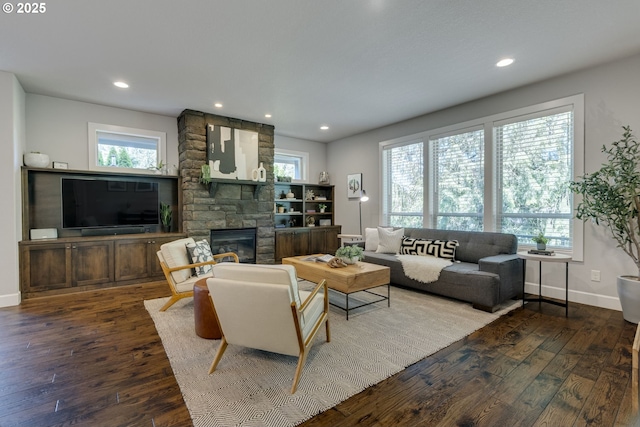 865 SW Trillium Ln, Portland, OR 97219 - living room with hardwood / wood-style flooring, a stone fireplace, and recessed lighting