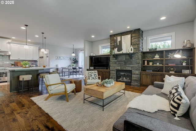 865 SW Trillium Ln, Portland, OR 97219 - living room featuring wood finished floors, recessed lighting, and a fireplace