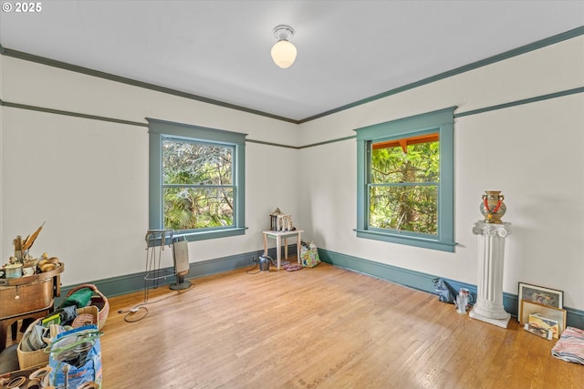 2516 NE Clackamas St, Portland, OR 97232 - workout room featuring plenty of natural light, wood finished floors, ornamental molding, and ornate columns