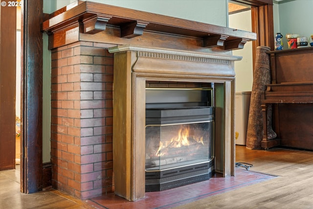 2516 NE Clackamas St, Portland, OR 97232 - detailed view of wood finished floors and a glass covered fireplace