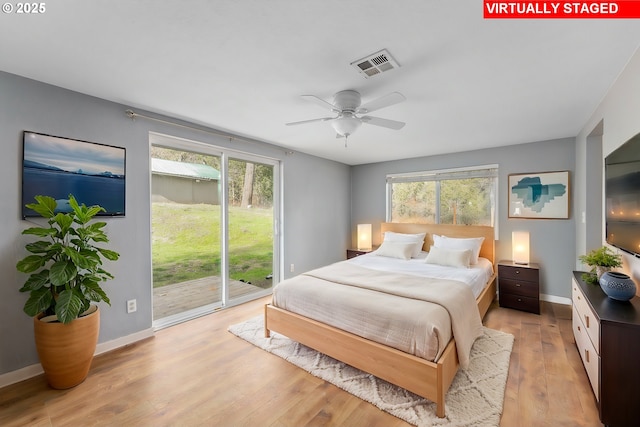 bedroom with ceiling fan, access to exterior, and light hardwood / wood-style flooring