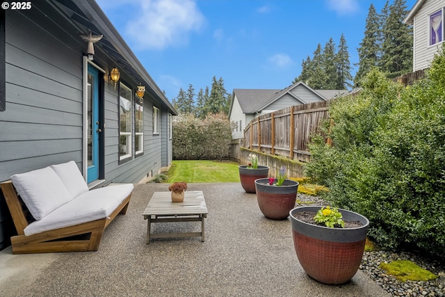 view of patio / terrace featuring a fenced backyard and an outdoor hangout area