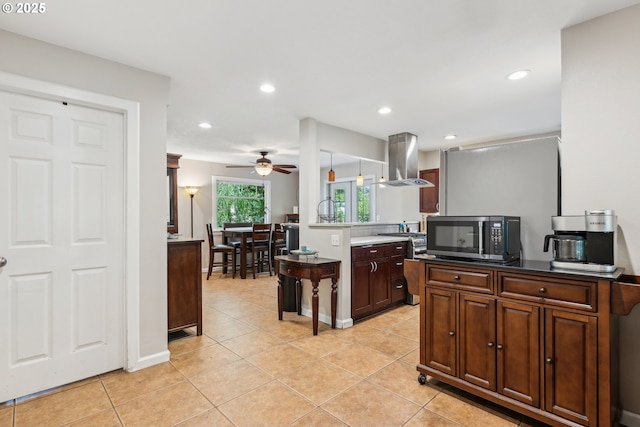 4315 NE 90th Ave, Portland, OR 97220 - kitchen featuring stainless steel microwave, island exhaust hood, ceiling fan, light tile patterned floors, and recessed lighting
