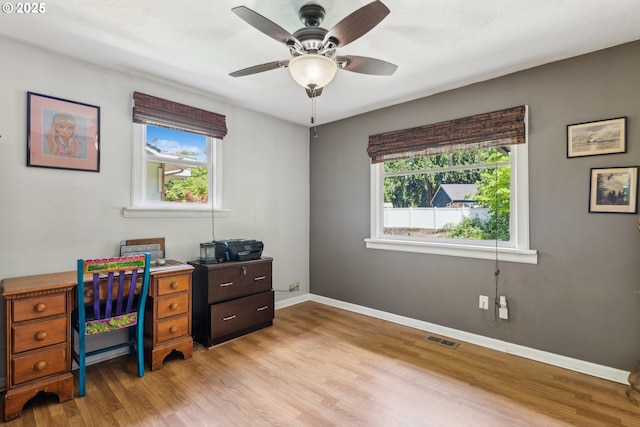 4315 NE 90th Ave, Portland, OR 97220 - office space with light wood-style floors, a ceiling fan, and baseboards