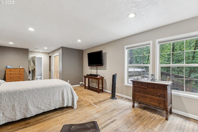 4315 NE 90th Ave, Portland, OR 97220 - bedroom with baseboards, light wood finished floors, and recessed lighting
