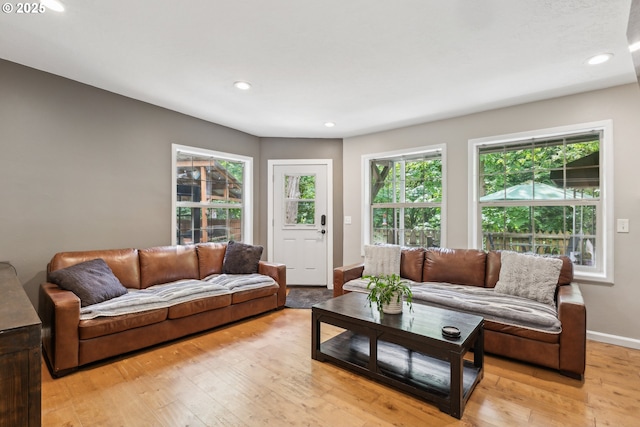 4315 NE 90th Ave, Portland, OR 97220 - living area with light wood-style flooring, recessed lighting, and baseboards
