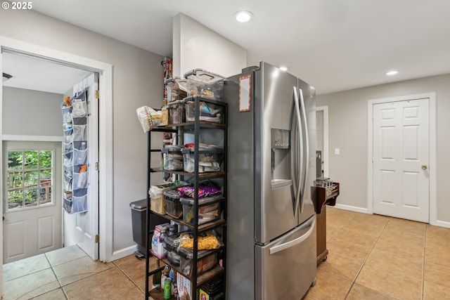 4315 NE 90th Ave, Portland, OR 97220 - kitchen featuring stainless steel refrigerator with ice dispenser, light tile patterned floors, recessed lighting, and baseboards