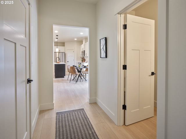 117 Witherbee Rd, Kelso, WA 98626 - hallway featuring light wood finished floors, baseboards, and recessed lighting