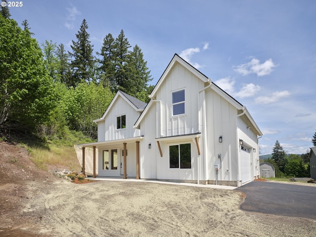 117 Witherbee Rd, Kelso, WA 98626 - modern inspired farmhouse featuring board and batten siding and asphalt driveway
