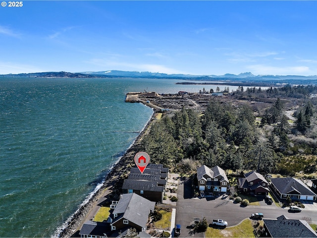 12 NW 17th Pl, Warrenton, OR 97146 - aerial perspective of suburban area featuring a water and mountain view