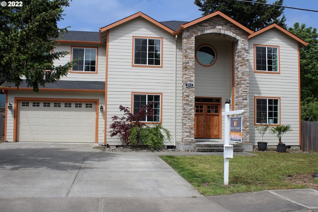 2917 SW 198th Ave, Beaverton, OR 97003 - traditional-style home featuring driveway, stone siding, an attached garage, and roof with shingles