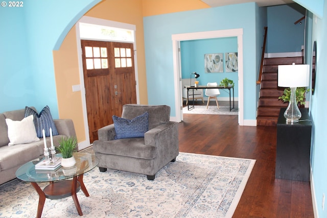 2917 SW 198th Ave, Beaverton, OR 97003 - living room with arched walkways, wood finished floors, and stairs