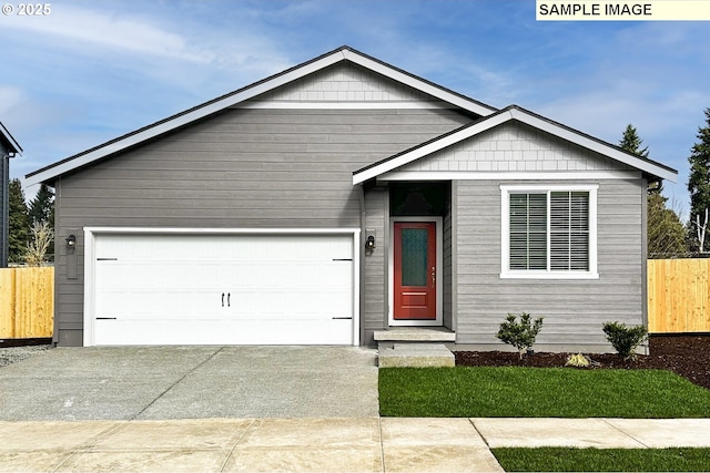 ranch-style house with concrete driveway, an attached garage, and fence