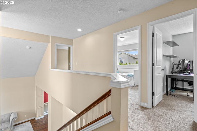 702 SW Burlingame Cir, Troutdale, OR 97060 - corridor featuring a textured ceiling, an upstairs landing, an office area, carpet, and recessed lighting