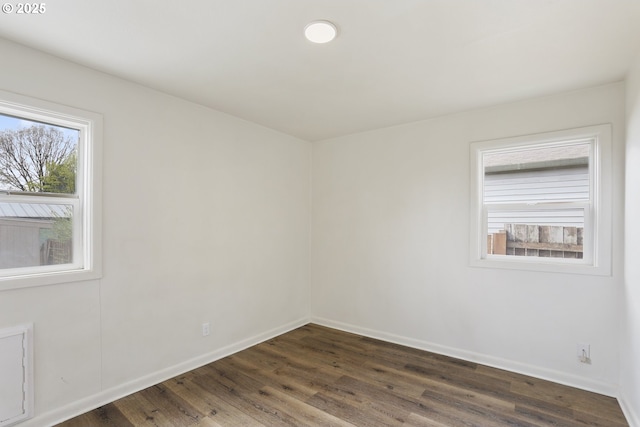 53112 NW Manor Dr, Scappoose, OR 97056 - unfurnished room with dark wood-style flooring and baseboards