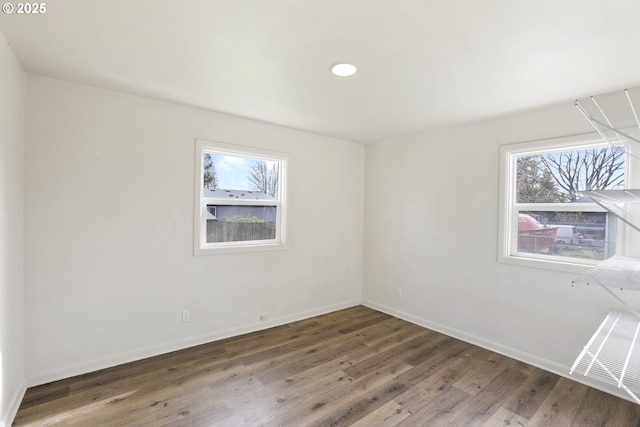 53112 NW Manor Dr, Scappoose, OR 97056 - unfurnished room with wood finished floors, baseboards, visible vents, and recessed lighting