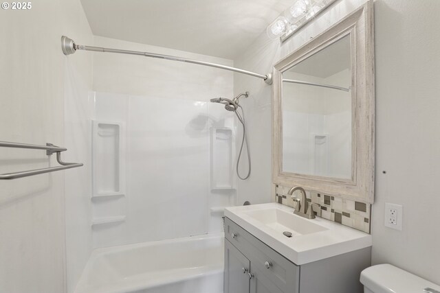 53112 NW Manor Dr, Scappoose, OR 97056 - full bathroom featuring toilet, tasteful backsplash, vanity, and washtub / shower combination