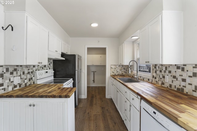 53112 NW Manor Dr, Scappoose, OR 97056 - kitchen with butcher block countertops, a sink, white appliances, and white cabinets