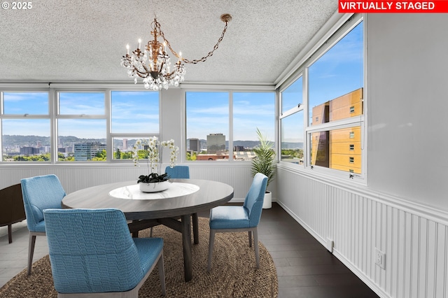 1220 NE 17th Ave Unit 12B, Portland, OR 97232 - sunroom featuring a chandelier and a city view