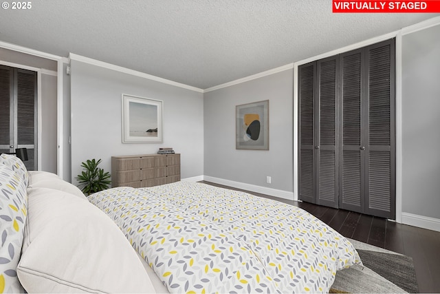 1220 NE 17th Ave Unit 12B, Portland, OR 97232 - bedroom with wood finished floors, a textured ceiling, ornamental molding, and a closet