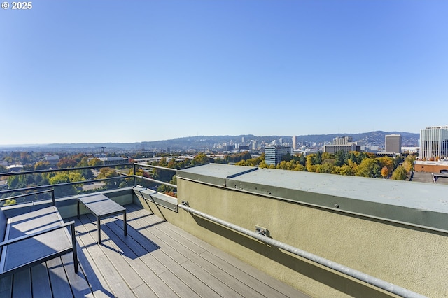 1220 NE 17th Ave Unit 12B, Portland, OR 97232 - wooden deck with a view of city
