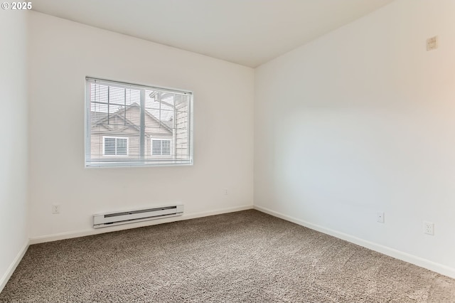 carpeted spare room featuring a baseboard radiator and baseboards