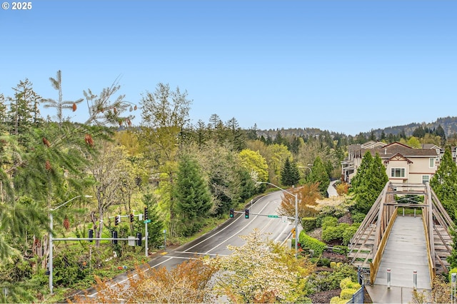 exterior space with a view of trees